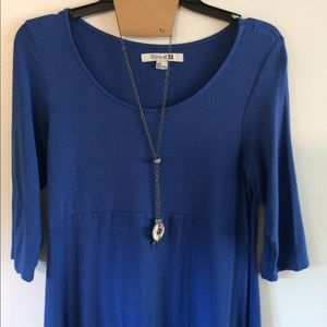 Simple dress with boutique necklace